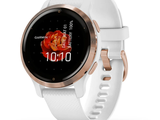a close up of a smart watch on a white surface