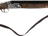 a close up of a rifle with a gun attached to it