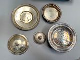 a lot of silver objects on the table