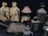 a lot of antique items that are sitting on a table