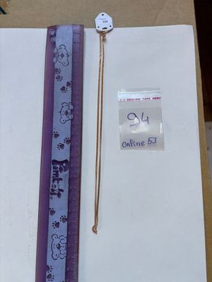 a picture of a piece of paper and a ruler on a table