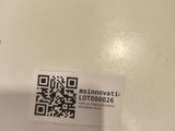 a white toilet with a qr code on it