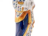 a close up of a figurine of a woman holding a child