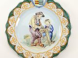 a plate with a picture of a man and a child on it