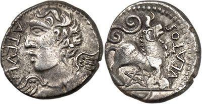 a silver coin with an image of a woman on it