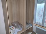 a closet with a lot of boxes in it