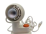 an image of a desk fan with a light on top of it