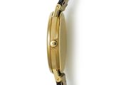 an image of a close up of a wrist watch on a white surface