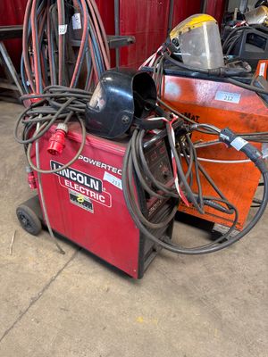 an image of a welding machine in a garage