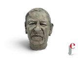 a bust of a man with a moustache on his face