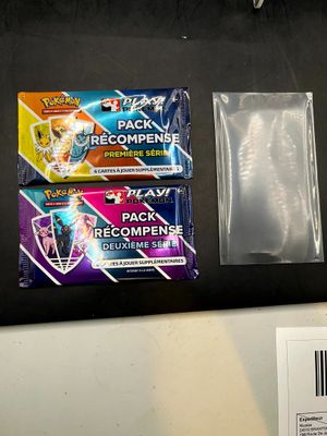 de nombreux types de cartes Pokémon exposées