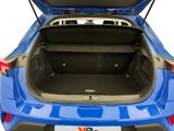 the back of a blue car with its trunk open showing the trunk space