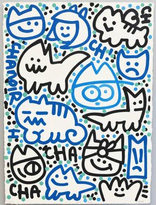 un gros plan sur un dessin réalisé sur une feuille de papier, avec des inscriptions en bleu et en noir