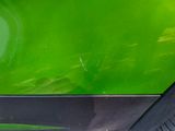 a close up view of a car ' s interior with green paint