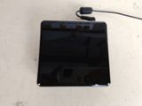 a picture of a black tablet computer on a table