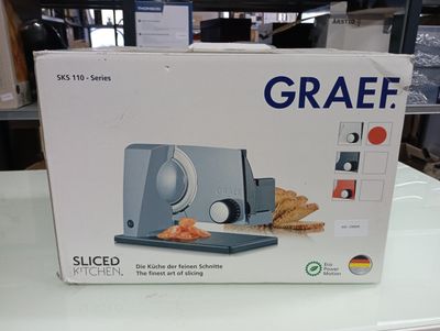 packaging for a slicer sitting on top of a table in a store