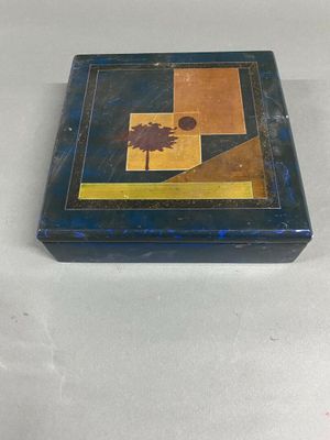 a blue box with a picture of a palm tree on it