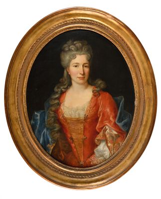 an oval portrait of a woman in a red dress holding a cat