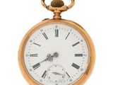une vieille montre de poche en or avec des chiffres romains et des chiffres romains sur le cadran
