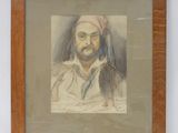 tableau représentant un homme barbu coiffé d'un turban rose, dans un cadre en bois
