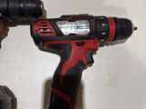 a cordless drill and a cordless drill on a table