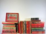 a lot of books that are sitting on a table