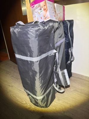 bags of diapers are stacked on top of each other in a room