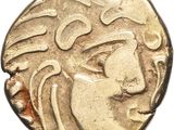 un gros plan d'une pièce de monnaie avec un visage dessus