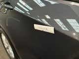 a sticker on the door of a car that says chevy