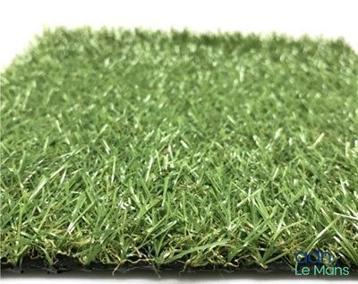 a close up view of a green artificial grass mat
