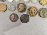 a lot of coins that are sitting on a table