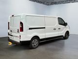 a white van that is parked in a room
