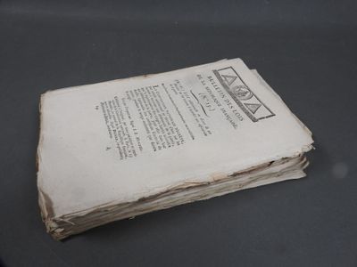 an old book sitting on top of a table