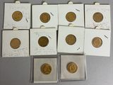a bunch of coins are sitting on top of a table