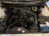 a picture of a car engine with its hood open