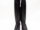 pair of black leather boots on a white background with a white background
