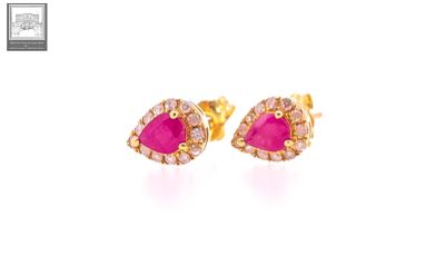 a pair of pink sapphire and diamond earrings on a white background