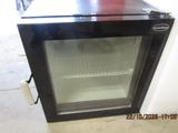 an image of a small oven with a glass door