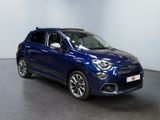 a blue fiat suv parked in a room with a white wall