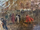 a painting of a group of people walking down the street