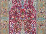 un tapis rouge et bleu à motifs floraux