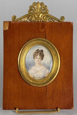 portrait of a woman in a white dress in a wooden frame