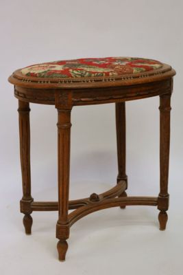 a small table with a floral design on top of it