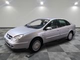 a picture of a silver car on a checkered floor