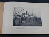 an old photo of a group of people standing in front of a ship