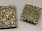 pair of antique brass bookends depicting a man and a woman