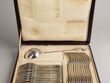a case with a set of silverware in it