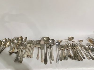 a lot of spoons and spoon spoons on the table