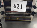 une photo d'une machine sur laquelle figure une étiquette de prix