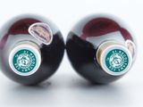 two black balls with a starbucks logo on them